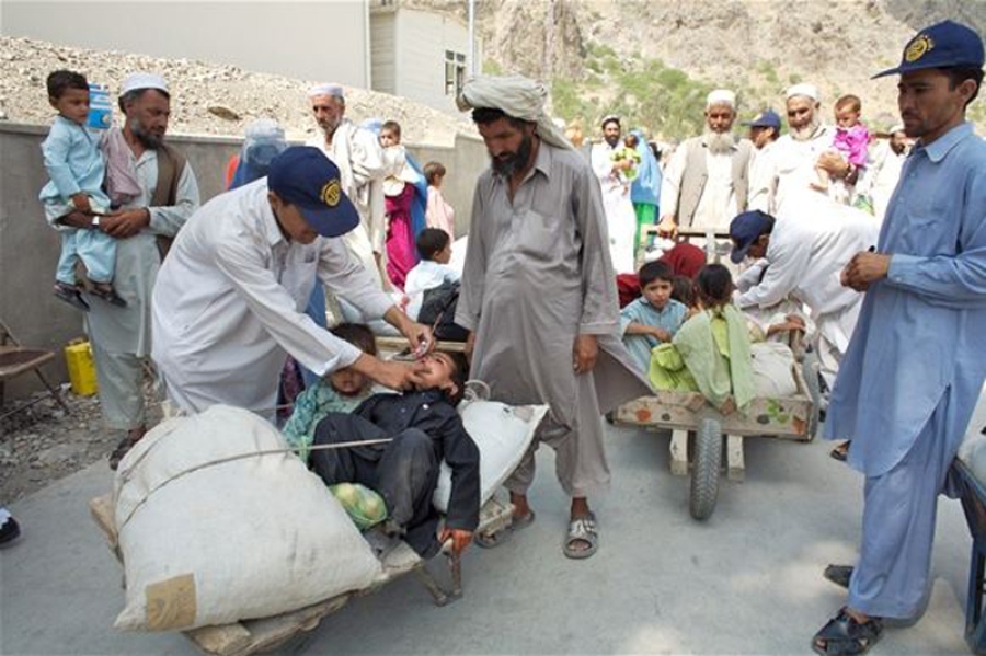 Image of checking child at the time of campaigns by IHLO in afghanistan 